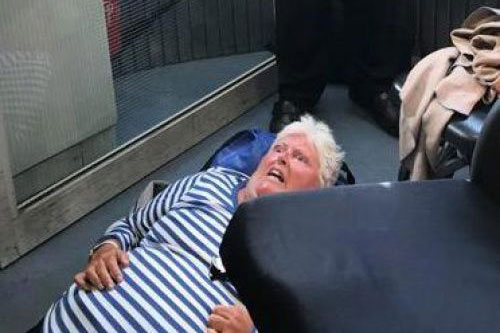 Crew Drops Passenger on Head