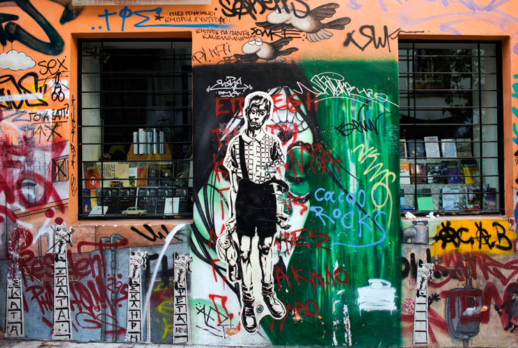 Graffiti is displayed on a building on December 6, 2011 in Athens, Greece. Graffiti artists throughout the city are expressing the effects of austerity measures that have plagued the community as Greece continues to struggle in debt while lawmakers today