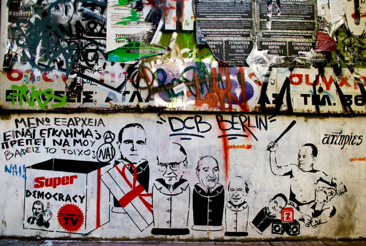 Graffiti is displayed on a building on December 6, 2011 in Athens, Greece. Graffiti artists throughout the city are expressing the effects of austerity measures that have plagued the community as Greece continues to struggle in debt while lawmakers today
